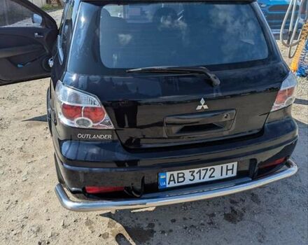 Черный Мицубиси Аутлендер, объемом двигателя 2 л и пробегом 189 тыс. км за 7100 $, фото 8 на Automoto.ua