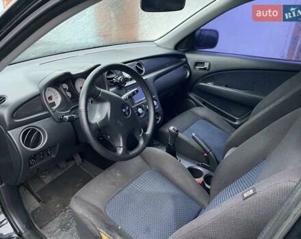 Черный Мицубиси Аутлендер, объемом двигателя 2 л и пробегом 306 тыс. км за 6500 $, фото 8 на Automoto.ua