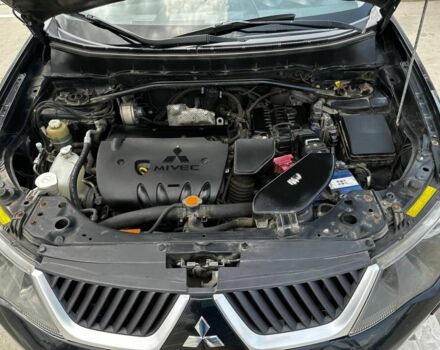 Чорний Міцубісі Аутлендер, об'ємом двигуна 2.4 л та пробігом 137 тис. км за 8999 $, фото 6 на Automoto.ua