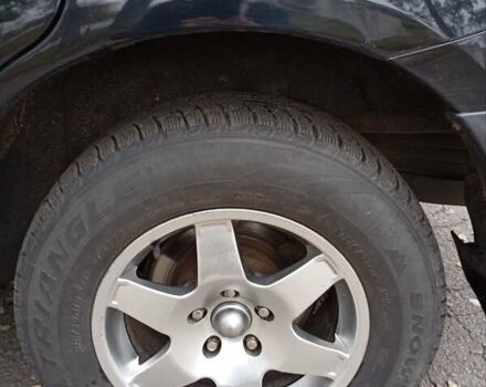 Чорний Міцубісі Аутлендер, об'ємом двигуна 2.36 л та пробігом 265 тис. км за 8800 $, фото 14 на Automoto.ua