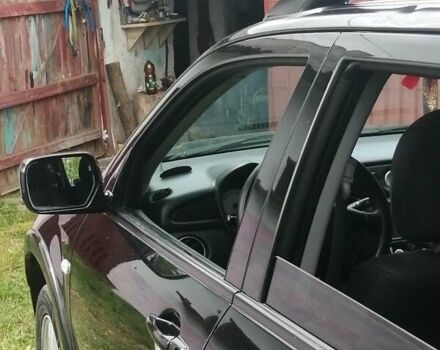 Чорний Міцубісі Аутлендер, об'ємом двигуна 2 л та пробігом 208 тис. км за 6700 $, фото 1 на Automoto.ua