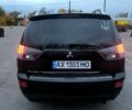 Черный Мицубиси Аутлендер, объемом двигателя 2.4 л и пробегом 210 тыс. км за 7800 $, фото 2 на Automoto.ua