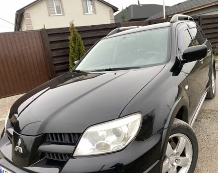 Черный Мицубиси Аутлендер, объемом двигателя 2.4 л и пробегом 178 тыс. км за 6900 $, фото 12 на Automoto.ua