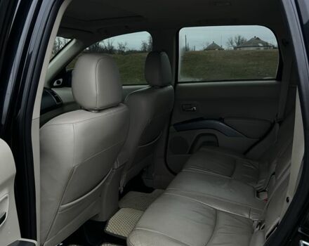 Черный Мицубиси Аутлендер, объемом двигателя 2.4 л и пробегом 230 тыс. км за 8800 $, фото 5 на Automoto.ua