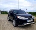 Черный Мицубиси Аутлендер, объемом двигателя 2.4 л и пробегом 180 тыс. км за 8900 $, фото 6 на Automoto.ua