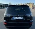 Черный Мицубиси Аутлендер, объемом двигателя 2.4 л и пробегом 116 тыс. км за 10700 $, фото 3 на Automoto.ua