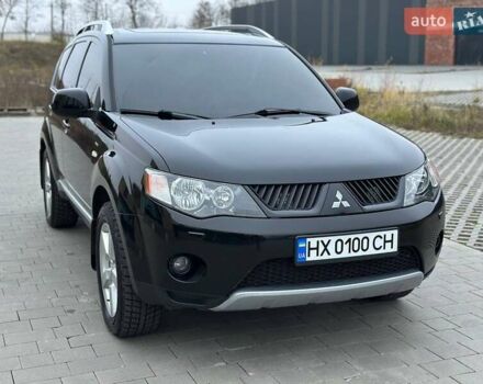 Черный Мицубиси Аутлендер, объемом двигателя 3 л и пробегом 248 тыс. км за 9800 $, фото 3 на Automoto.ua