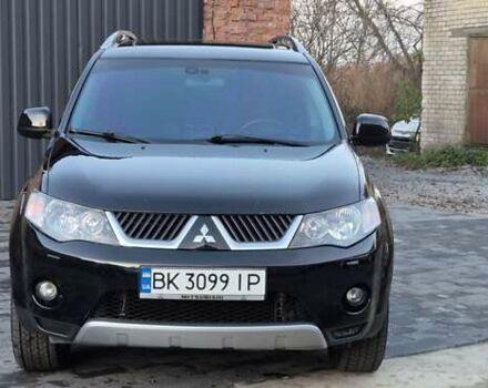 Чорний Міцубісі Аутлендер, об'ємом двигуна 2.4 л та пробігом 230 тис. км за 9700 $, фото 2 на Automoto.ua