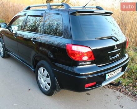 Черный Мицубиси Аутлендер, объемом двигателя 2 л и пробегом 189 тыс. км за 7200 $, фото 40 на Automoto.ua