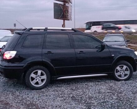 Черный Мицубиси Аутлендер, объемом двигателя 2 л и пробегом 271 тыс. км за 6940 $, фото 9 на Automoto.ua