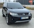 Черный Мицубиси Аутлендер, объемом двигателя 3 л и пробегом 248 тыс. км за 9800 $, фото 3 на Automoto.ua