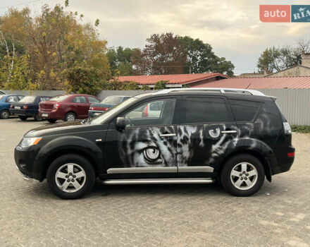 Черный Мицубиси Аутлендер, объемом двигателя 2.4 л и пробегом 230 тыс. км за 6650 $, фото 7 на Automoto.ua