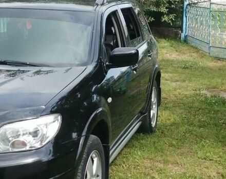 Чорний Міцубісі Аутлендер, об'ємом двигуна 2 л та пробігом 208 тис. км за 6700 $, фото 4 на Automoto.ua