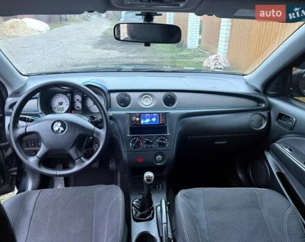 Черный Мицубиси Аутлендер, объемом двигателя 2 л и пробегом 232 тыс. км за 7000 $, фото 9 на Automoto.ua