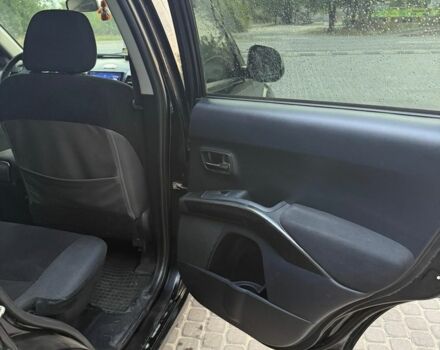 Черный Мицубиси Аутлендер, объемом двигателя 2.4 л и пробегом 369 тыс. км за 8500 $, фото 11 на Automoto.ua