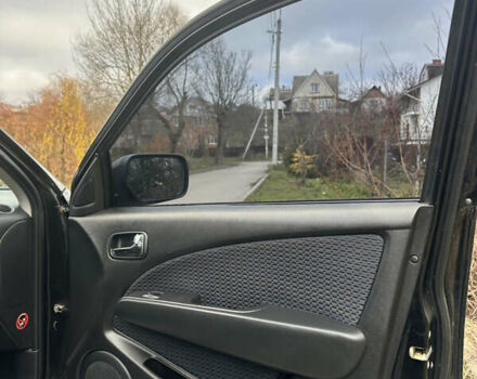 Чорний Міцубісі Аутлендер, об'ємом двигуна 2 л та пробігом 118 тис. км за 8100 $, фото 23 на Automoto.ua