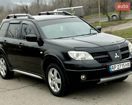Черный Мицубиси Аутлендер, объемом двигателя 2.4 л и пробегом 245 тыс. км за 6500 $, фото 5 на Automoto.ua