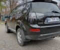 Чорний Міцубісі Аутлендер, об'ємом двигуна 2.36 л та пробігом 265 тис. км за 8800 $, фото 16 на Automoto.ua
