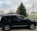 Чорний Міцубісі Аутлендер, об'ємом двигуна 2 л та пробігом 238 тис. км за 5500 $, фото 4 на Automoto.ua