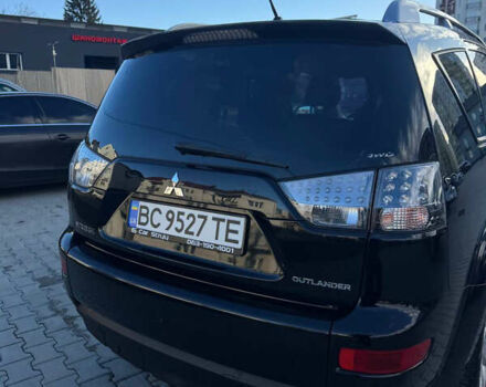 Черный Мицубиси Аутлендер, объемом двигателя 1.97 л и пробегом 202 тыс. км за 9700 $, фото 2 на Automoto.ua