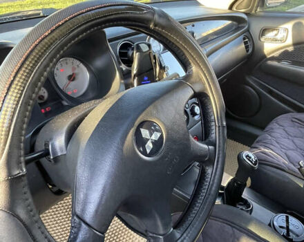 Чорний Міцубісі Аутлендер, об'ємом двигуна 2 л та пробігом 218 тис. км за 6300 $, фото 16 на Automoto.ua