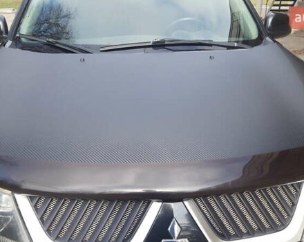 Чорний Міцубісі Аутлендер, об'ємом двигуна 2.36 л та пробігом 277 тис. км за 8500 $, фото 1 на Automoto.ua