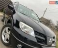 Черный Мицубиси Аутлендер, объемом двигателя 2.4 л и пробегом 178 тыс. км за 6900 $, фото 14 на Automoto.ua