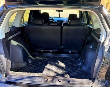 Черный Мицубиси Аутлендер, объемом двигателя 2.4 л и пробегом 208 тыс. км за 10200 $, фото 6 на Automoto.ua