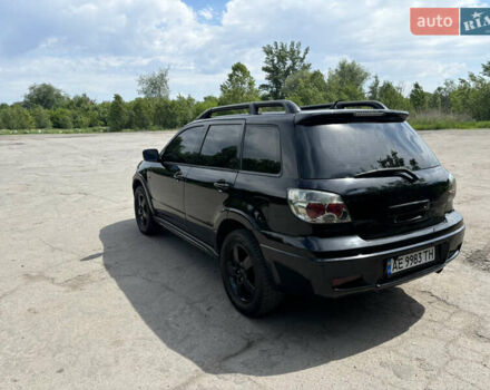 Мицубиси Аутлендер 2008 в Днепре (Днепропетровске) на Automoto.ua Черный Мицубиси Аутлендер, объемом двигателя 2.38 л и пробегом 320 тыс. км за 7500 $, фото 7 на Automoto.ua