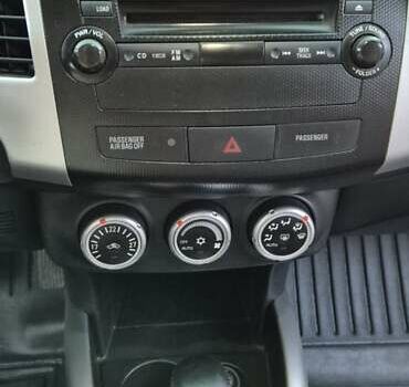 Чорний Міцубісі Аутлендер, об'ємом двигуна 2.4 л та пробігом 230 тис. км за 9700 $, фото 15 на Automoto.ua