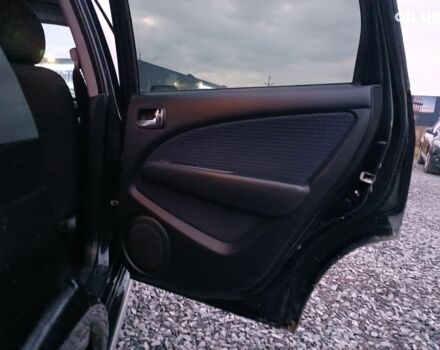 Черный Мицубиси Аутлендер, объемом двигателя 2 л и пробегом 271 тыс. км за 6940 $, фото 18 на Automoto.ua