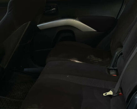 Черный Мицубиси Аутлендер, объемом двигателя 1.97 л и пробегом 265 тыс. км за 9600 $, фото 12 на Automoto.ua