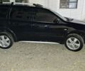 Чорний Міцубісі Аутлендер, об'ємом двигуна 2 л та пробігом 117 тис. км за 7900 $, фото 2 на Automoto.ua