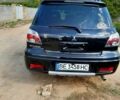 Чорний Міцубісі Аутлендер, об'ємом двигуна 2 л та пробігом 202 тис. км за 8000 $, фото 1 на Automoto.ua