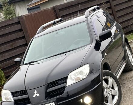 Черный Мицубиси Аутлендер, объемом двигателя 2.4 л и пробегом 178 тыс. км за 6900 $, фото 8 на Automoto.ua
