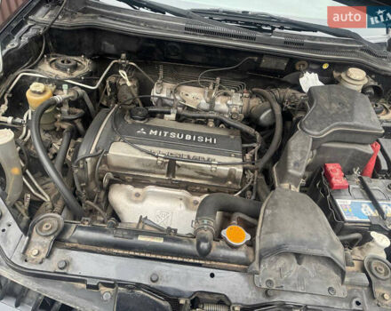Черный Мицубиси Аутлендер, объемом двигателя 2 л и пробегом 130 тыс. км за 7500 $, фото 7 на Automoto.ua