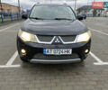 Черный Мицубиси Аутлендер, объемом двигателя 1.97 л и пробегом 244 тыс. км за 8800 $, фото 2 на Automoto.ua
