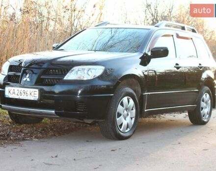 Черный Мицубиси Аутлендер, объемом двигателя 2 л и пробегом 190 тыс. км за 6900 $, фото 5 на Automoto.ua