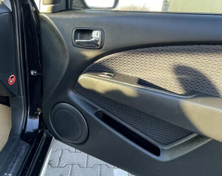 Чорний Міцубісі Аутлендер, об'ємом двигуна 2 л та пробігом 218 тис. км за 6300 $, фото 20 на Automoto.ua