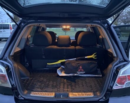 Чорний Міцубісі Аутлендер, об'ємом двигуна 2 л та пробігом 271 тис. км за 6799 $, фото 14 на Automoto.ua