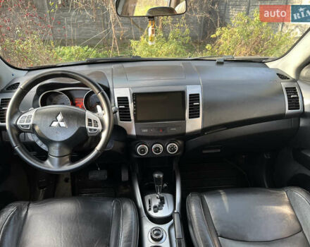 Чорний Міцубісі Аутлендер, об'ємом двигуна 2.4 л та пробігом 221 тис. км за 8900 $, фото 25 на Automoto.ua