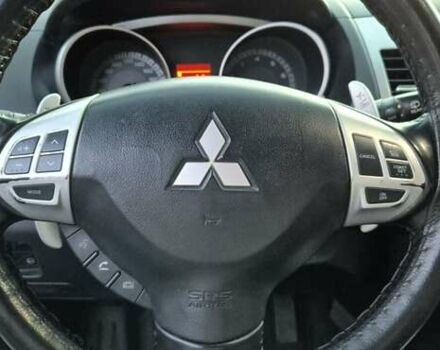 Чорний Міцубісі Аутлендер, об'ємом двигуна 2.4 л та пробігом 230 тис. км за 9700 $, фото 18 на Automoto.ua