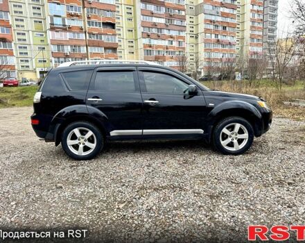 Черный Мицубиси Аутлендер, объемом двигателя 2.4 л и пробегом 229 тыс. км за 9790 $, фото 7 на Automoto.ua
