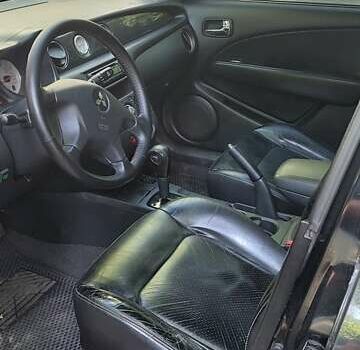 Черный Мицубиси Аутлендер, объемом двигателя 2.4 л и пробегом 150 тыс. км за 6300 $, фото 5 на Automoto.ua