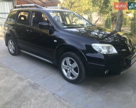 Чорний Міцубісі Аутлендер, об'ємом двигуна 2.38 л та пробігом 207 тис. км за 7000 $, фото 78 на Automoto.ua