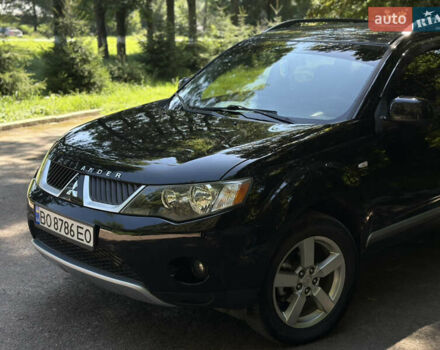 Черный Мицубиси Аутлендер, объемом двигателя 1.97 л и пробегом 265 тыс. км за 9600 $, фото 2 на Automoto.ua