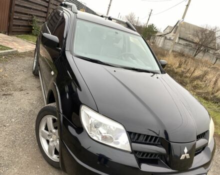 Черный Мицубиси Аутлендер, объемом двигателя 2.4 л и пробегом 178 тыс. км за 6900 $, фото 5 на Automoto.ua