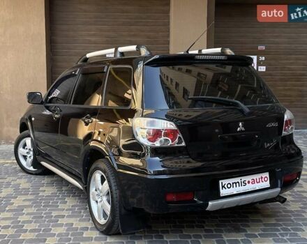 Черный Мицубиси Аутлендер, объемом двигателя 2 л и пробегом 270 тыс. км за 7199 $, фото 17 на Automoto.ua