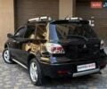 Черный Мицубиси Аутлендер, объемом двигателя 2 л и пробегом 270 тыс. км за 7199 $, фото 17 на Automoto.ua
