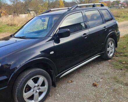 Міцубісі Аутлендер 2008 у Івано-Франківську на Automoto.ua Чорний Міцубісі Аутлендер, об'ємом двигуна 2 л та пробігом 128 тис. км за 7000 $, фото 26 на Automoto.ua
